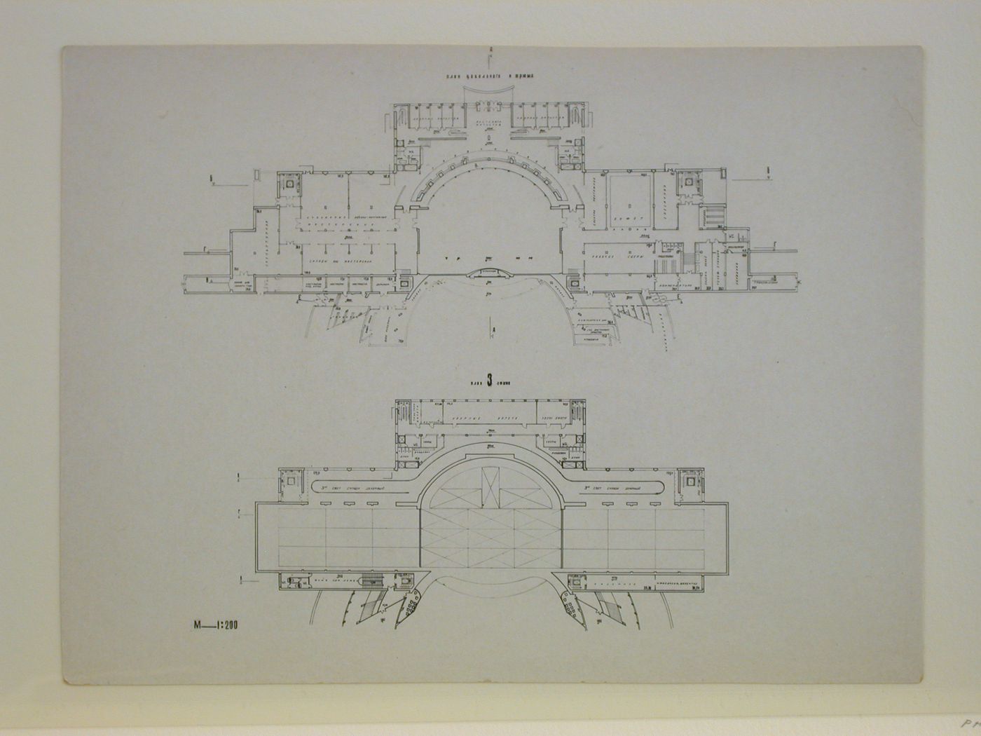 Photograph of a ground floor and basement plan and a third floor plan for a Red Army Theater, Moscow