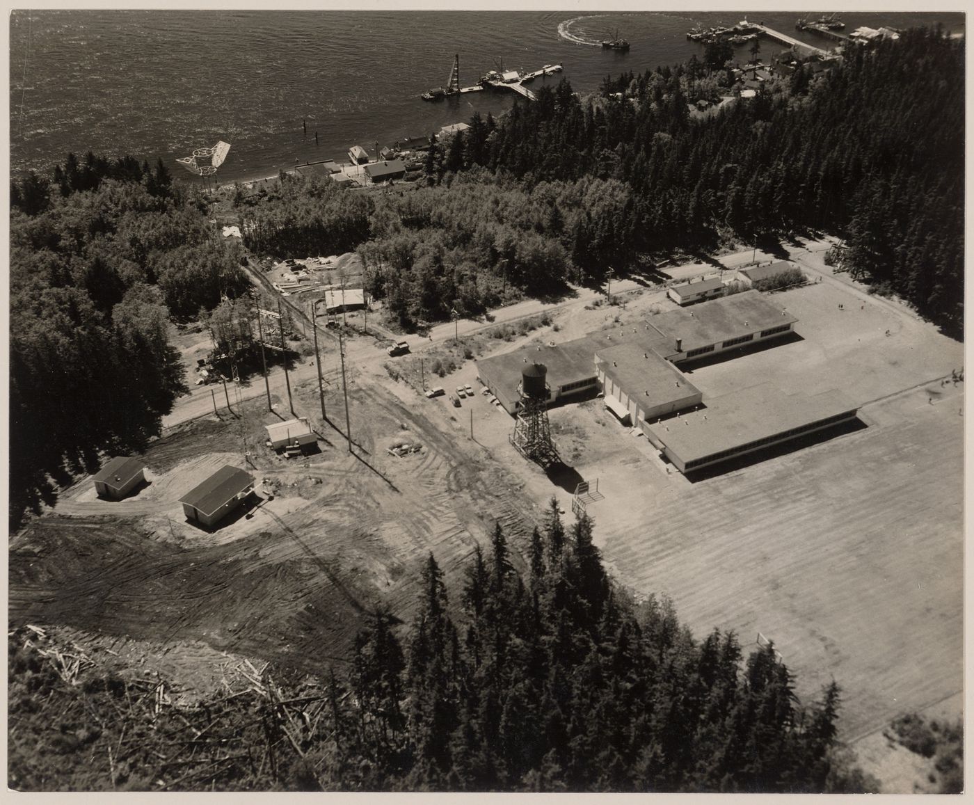 Aerial view of Alert Bay Elementary School and telecommunication towers, Alert Bay, British Columbia, Canada