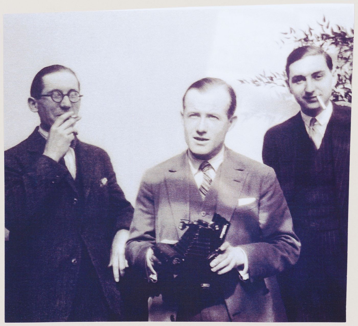 Le Corbusier, Pierre Jeanneret and Jean Fouquet at a party in Charlotte Perriand's apartment in Place Saint-Sulpice, Paris