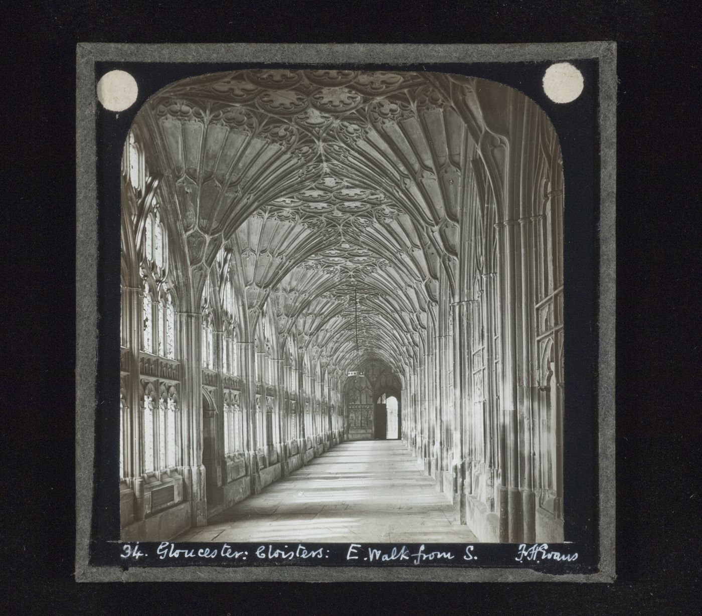 View of fan vaulting of east walk of cloisters of Gloucester Cathedral from south, Gloucester, Gloucestershire, England