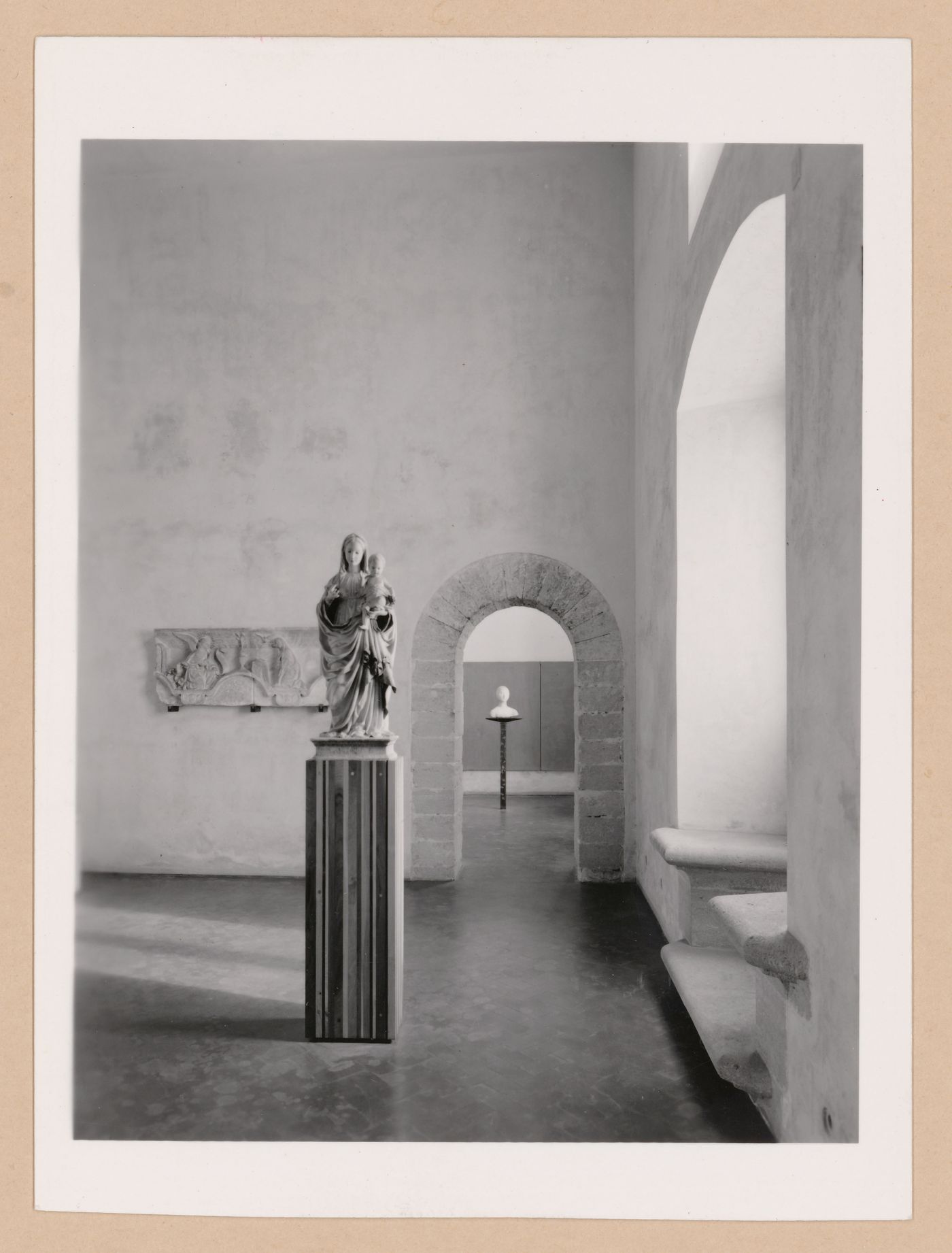 Interior view of the Sala dei Gagini showing sculptures with the Sala di F. Laurana in the background, Palazzo Abatellis, Galleria regionale della Sicilia, Palermo, Italy