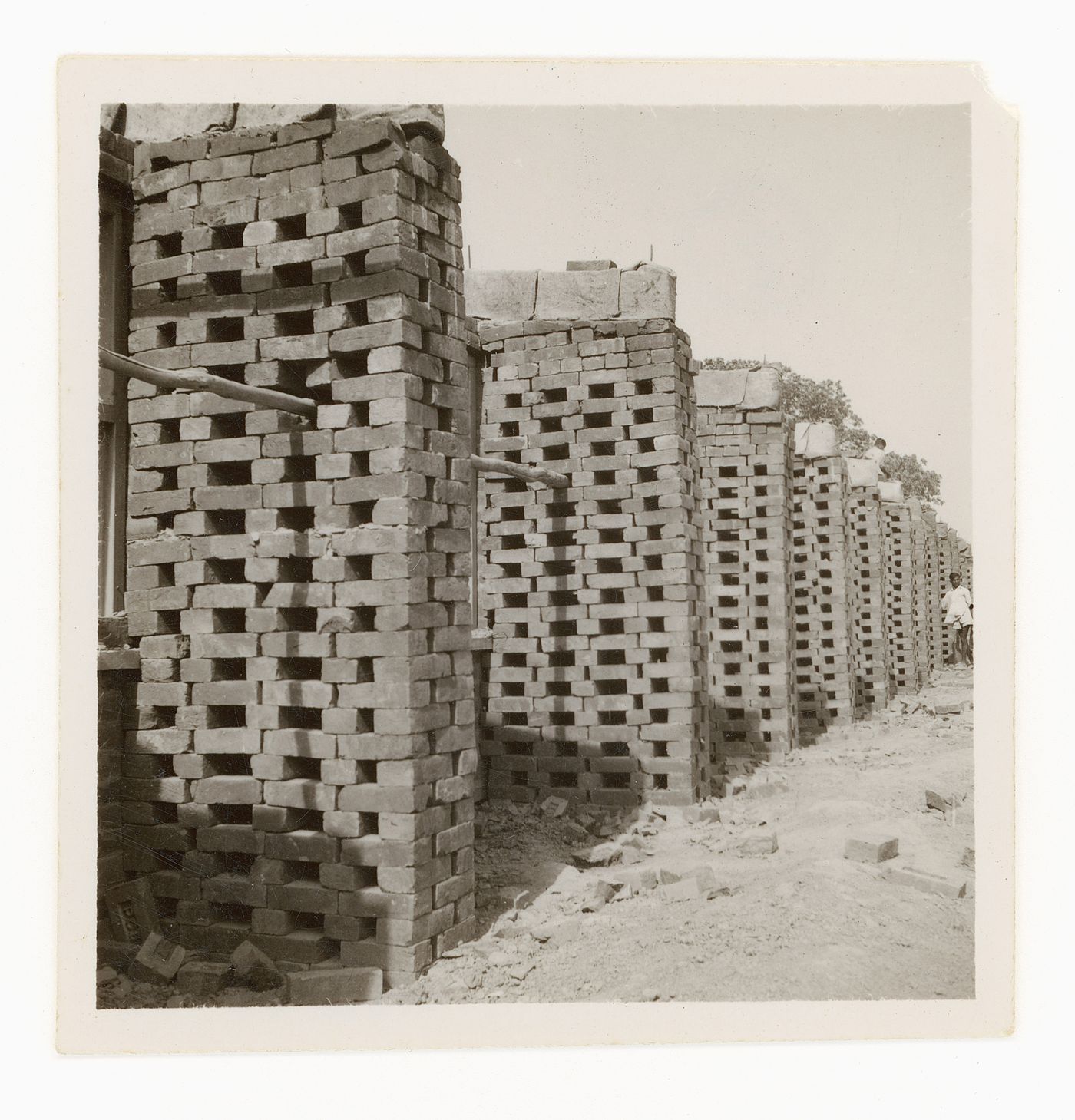 View of piles of bricks in rows at possibly a brick factory, Chandigarh, India