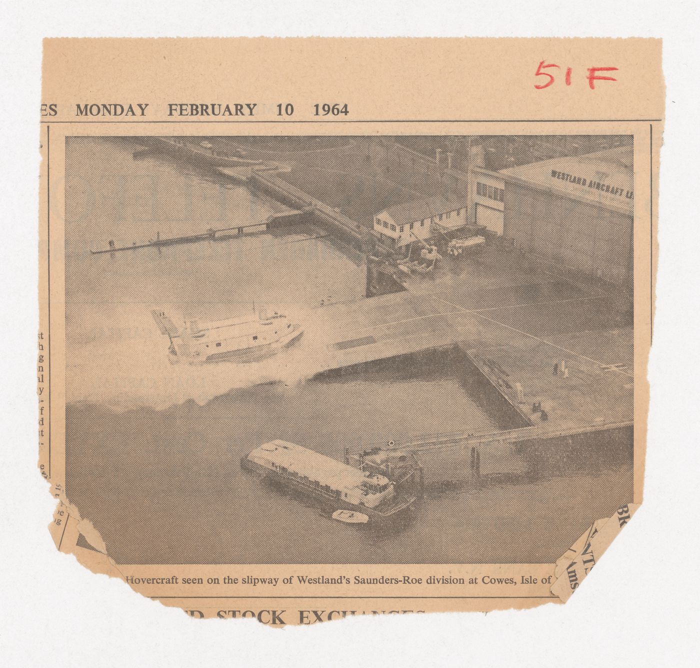 Newspaper clipping from The Times showing a photo of a hovercraft on the slipway of Westland's Saunders-Roe division