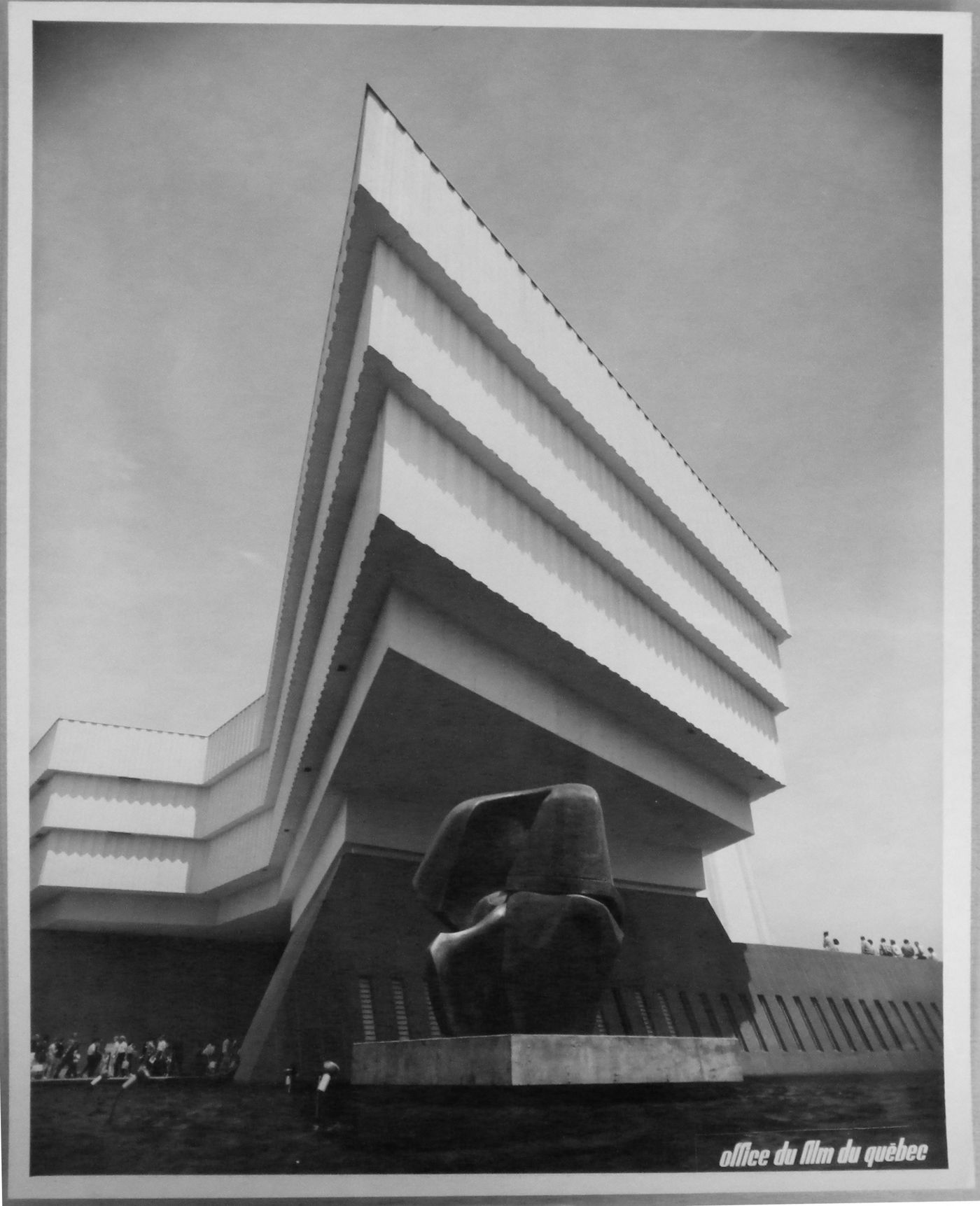 Partial view of the Great Britain Pavilion with the sculpture 'Locking Piece' by Henry Moore in foreground, Expo 67, Montréal, Québec