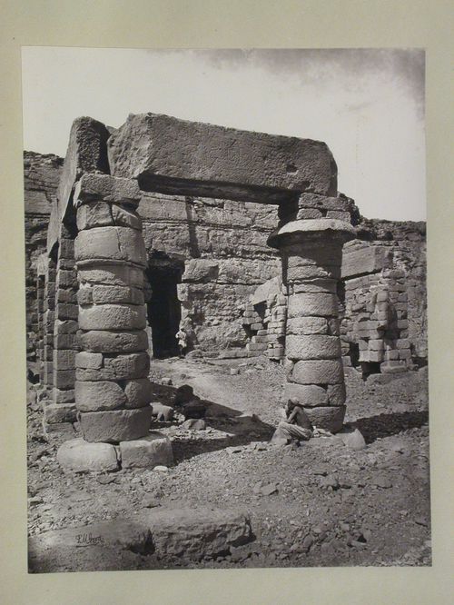 View of portico, temple of Gerf Hussein, with two local men, Lower Nubia (partially relocated to New Kalabsha), Egypt