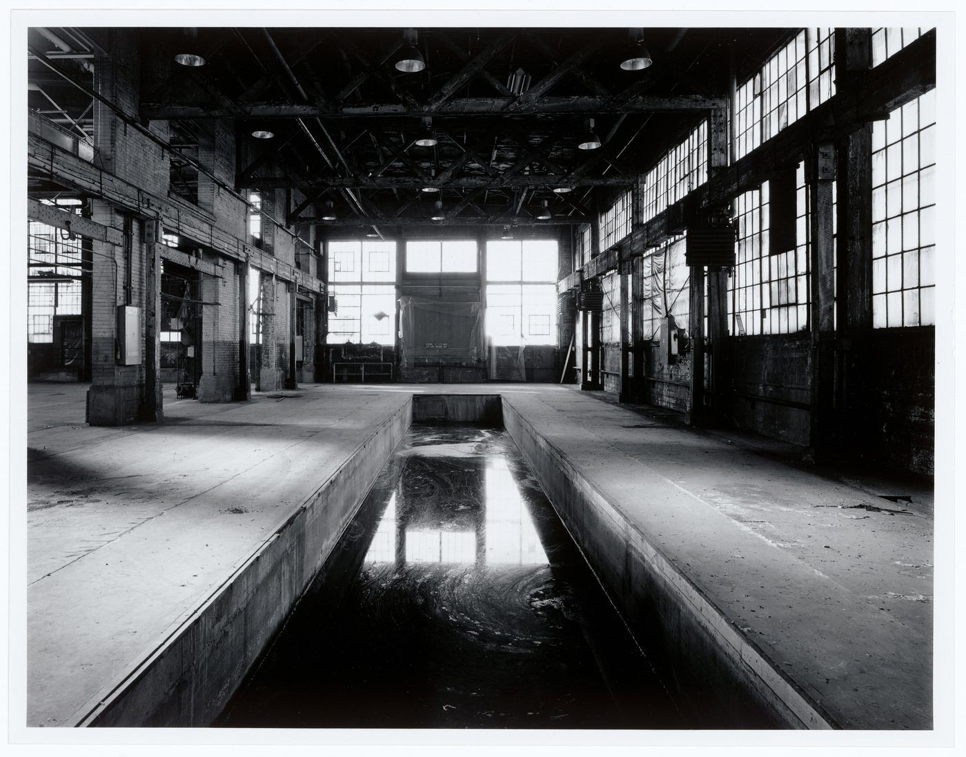 Interior view of the Canadian Switch & Spring Company Building showing the former pit (now a catchment for waste water), Montréal, Québec