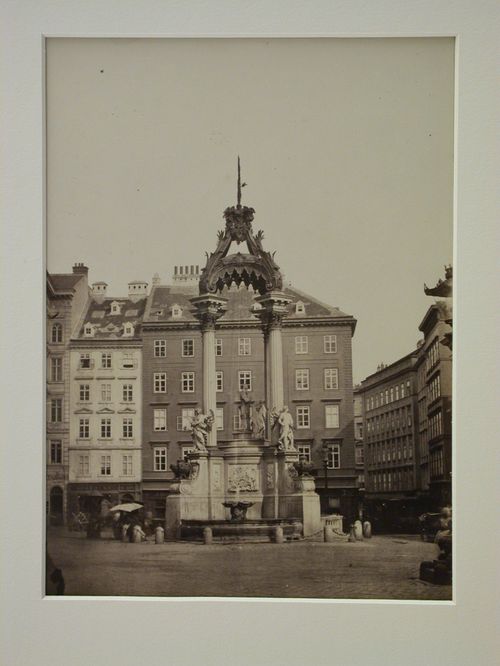 View of extremely tall fountain in market square, Vienna, Austria