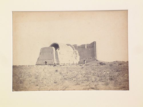 Distant view of the southern façade of the Taq-i Kisra [Iwan of Khusraw] (also known as the Taq-i Khusrau, Iwan-i Kisra and Taq-e Kisra), Ctesiphon (now Al Madain), Ottoman Empire (now in Iraq)