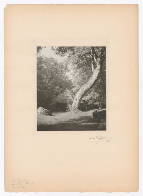 View of a stone and thatch shelter with two stone wells [?] in the foreground, Cape Breton Island, Nova Scotia, Canada