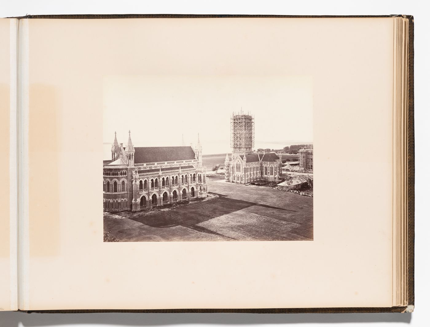 View of the Convocation Hall (also known as the University or Senate Hall) and the Library with the Rajabai Tower under construction, Bombay University (now Mumbai University), Mayo Road (now Bhaurao Patil Marg), Bombay (now Mumbai), India