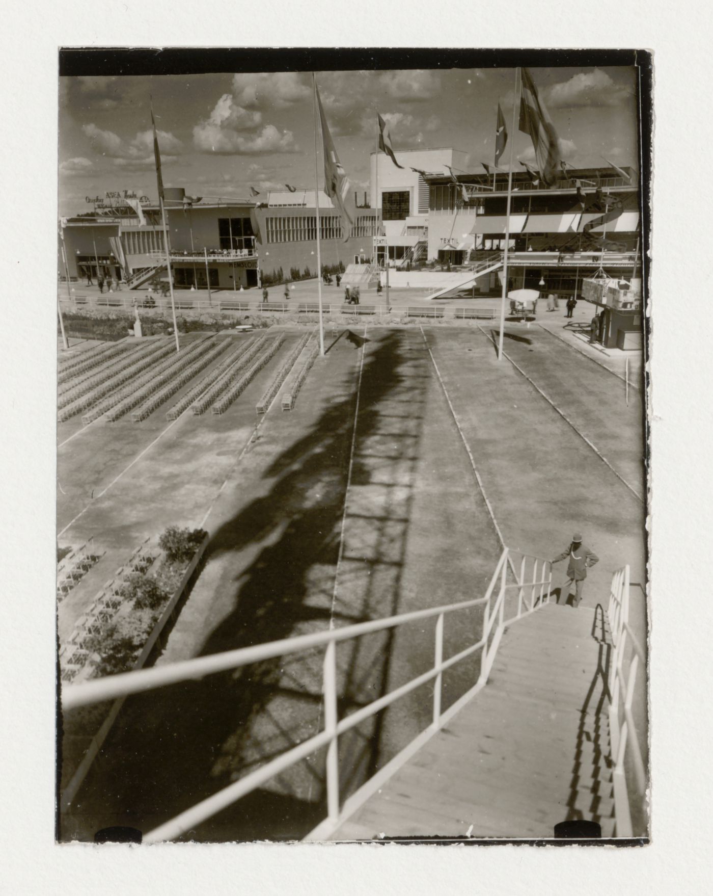 Exterior view of halls 19, 23, 25, 26, and 27 at the Stockholm Exhibition of 1930 from the stairs of the advertising mast, Stockholm