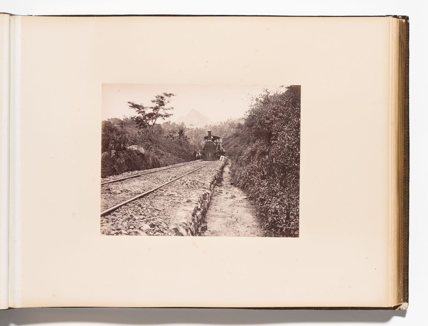 View of a locomotive on the Colombo-Kandy Railway, Ceylon (now Sri Lanka)