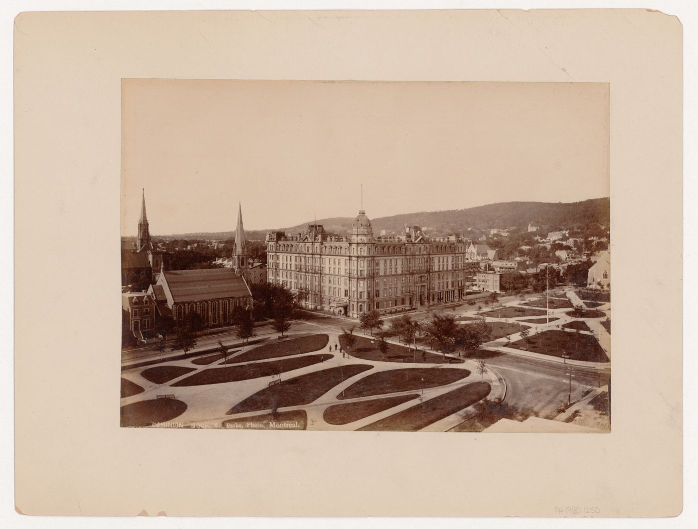 Aerial view of Dominion Square showing the Methodist Church and the Windsor Hotel in the background, Montréal, Québec