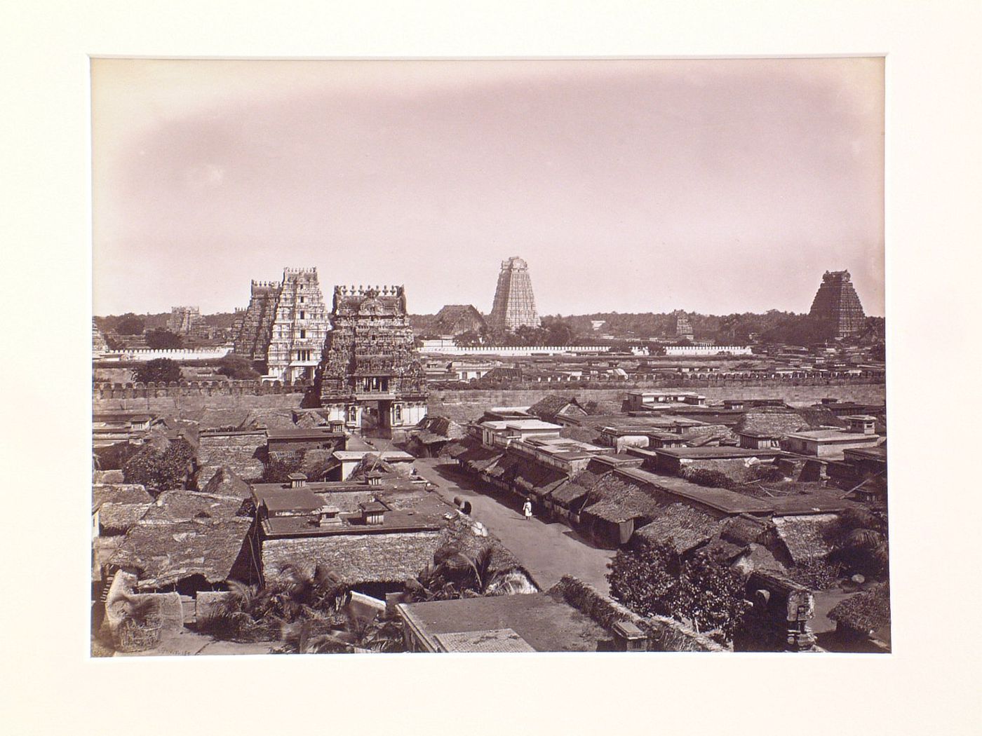 View of Sri Ranganatha Temple complex with dwellings in the foreground, Seringham (now Srirangam), India