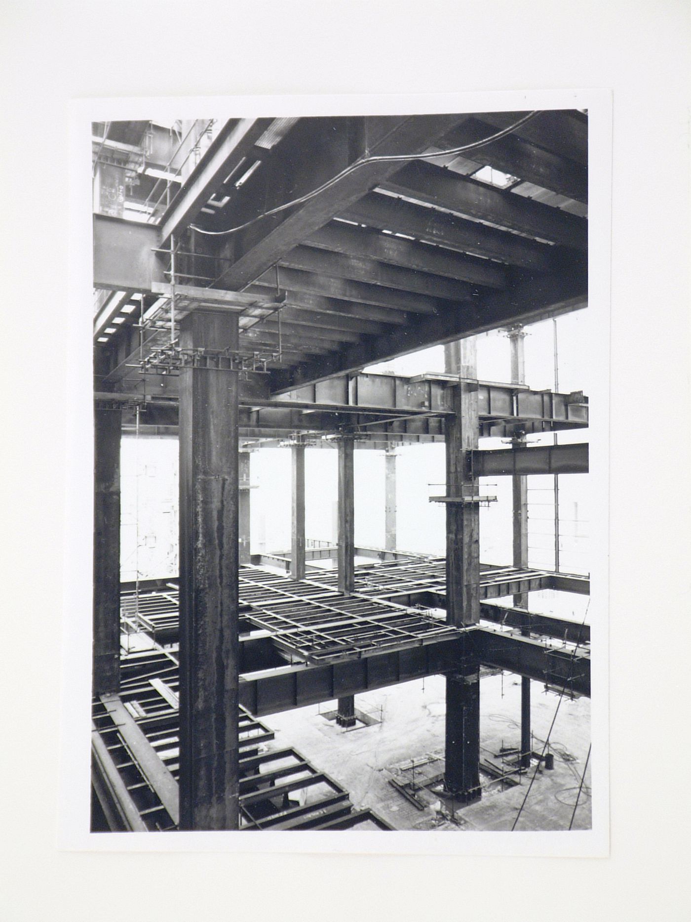 View of steel beams used for construction of power station, from interior, United Kingdom