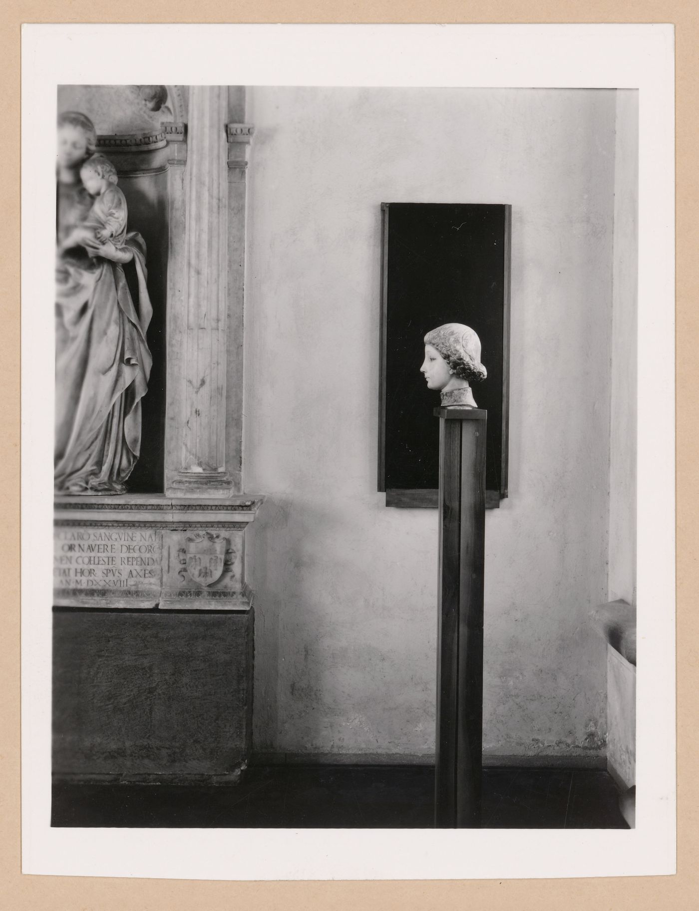 Interior view of the Sala dei Gagini showing the bust of a woman on a pedestal, Palazzo Abatellis, Galleria regionale della Sicilia, Palermo, Italy