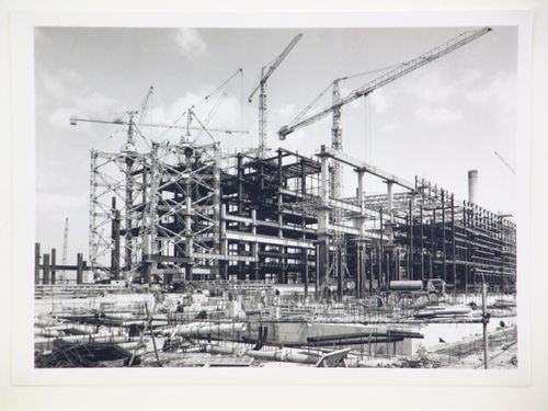 View of cranes and construction of steel structure for power station, from exterior, United Kingdom