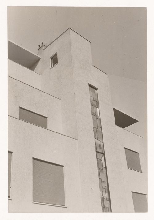 Partial view from below of top floors of the exterior of the Reifenberg hôtel particulier, showing the stained glass window, Mallet-Stevens road in the 16th arrondissement, Paris, France