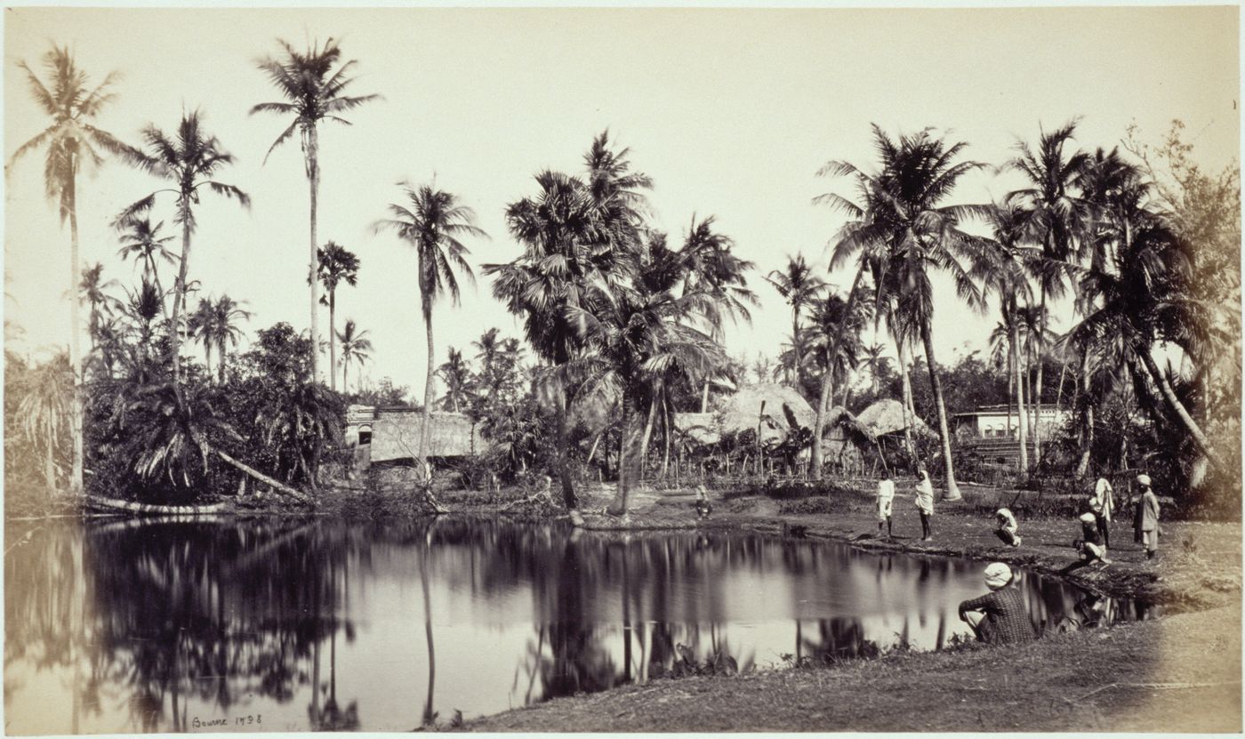View of a pond and a village in Bengal (now West Bengal), India