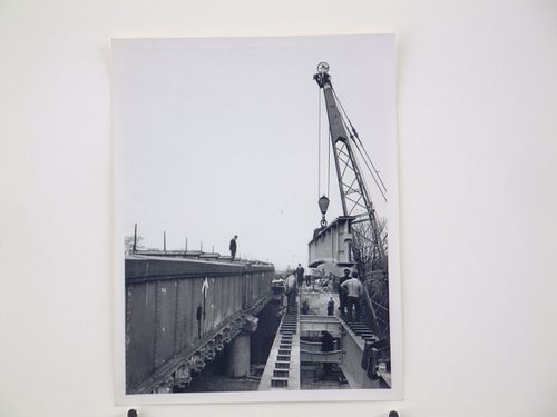 View of outer girder being lowered by crane, Bushey Bridge, England