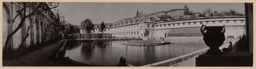 Panoramic view of courtyard and fountain, of renaissance palace, Prague, Czech Republic