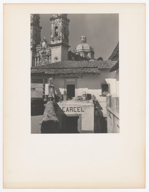 Partial view of Santa Prisca showing the towers and dome with a house in the foreground, Taxco de Alarcón, Mexico