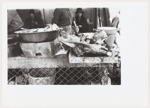 People and food in a market, South America