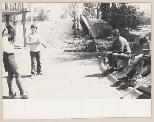 View of children and adults in Talmud Torah School Playground, Vancouver, British Columbia