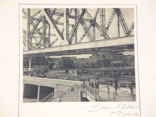 View of pedestrians on the Howrah Bridge over the Hooghly River, West Bengal, India