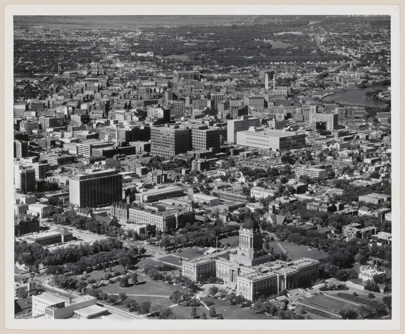 Business area with Manitoba Legislative Building in foreground, Winnipeg, Manitoba