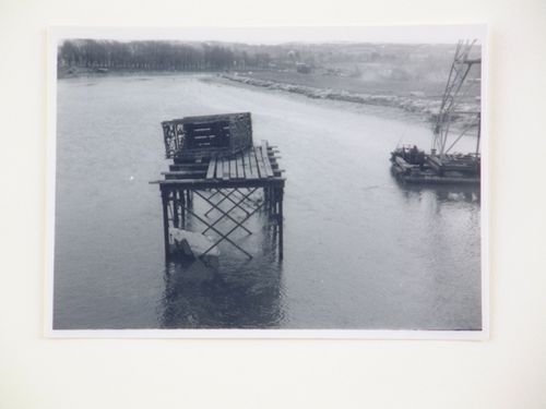 View of a wooden platform in the River Taw by Barnstaple Long Bridge, Devon, United Kingdom
