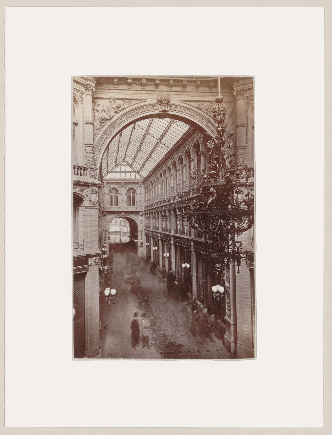 Interior view of the Kaisergalerie showing a glazed roof and shops, restaurants, concert hall, hotel and/or offices, Berlin, Germany