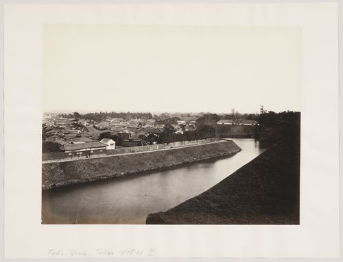 View of central Edo (now Tokyo), with the outer [?] moat of Edojo [Edo Castle] in the foreground, Japan