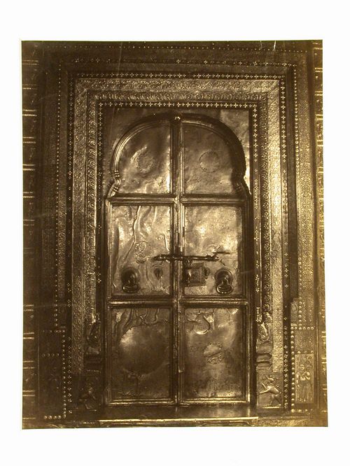 View of temple doors, possibly at the Temple of the Tooth (also known as the Sri Dalada Maligawa), Kandy, Ceylon (now Sri Lanka)