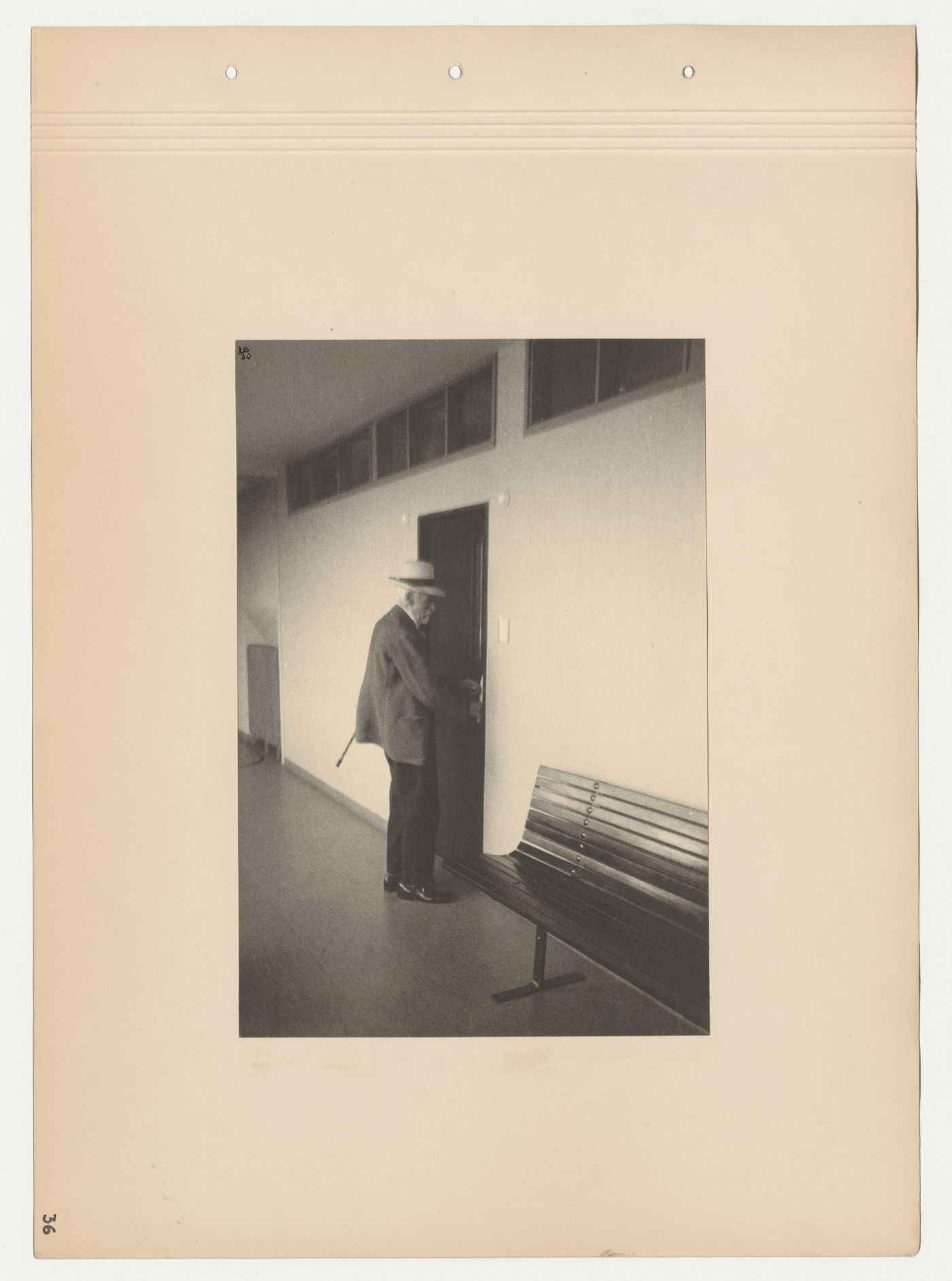 Interior view of a corridor with a resident opening an apartment door, Budge Foundation Old People's Home, Frankfurt am Main, Germany