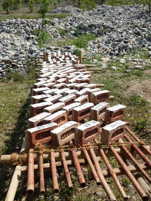 Weavers' Studio : samples of brick treated with stone powder and lime mixture,
