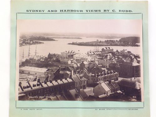 View of Miller's Point showing houses and commercial buildings with the harbour and Goat Island in the background, Sydney, Australia