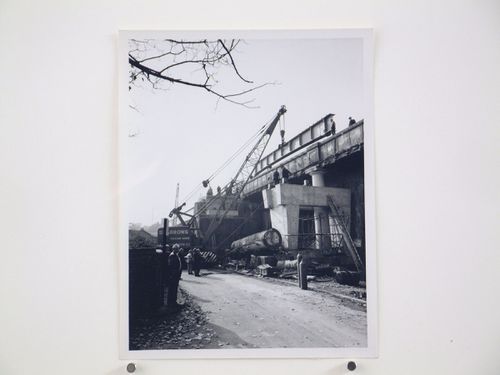 View of inner girder being lifted by crane from rail wagon, Bushey Bridge, England
