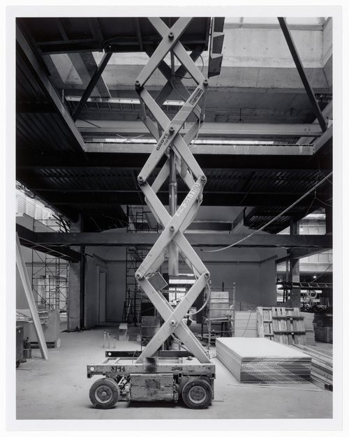 Interior view of the galleries 7 to 3 showing an extended manlift in the foreground, Canadian Centre for Architecture under construction, Montréal, Québec, Canada