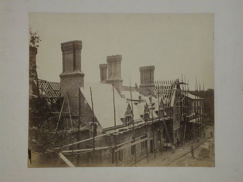 Partial view of the north façade of Voelas Hall under construction showing a portion of the former manor house "Lima" prior to its enclosure into the new hall, Pentrefoelas, Denbighshire, Wales