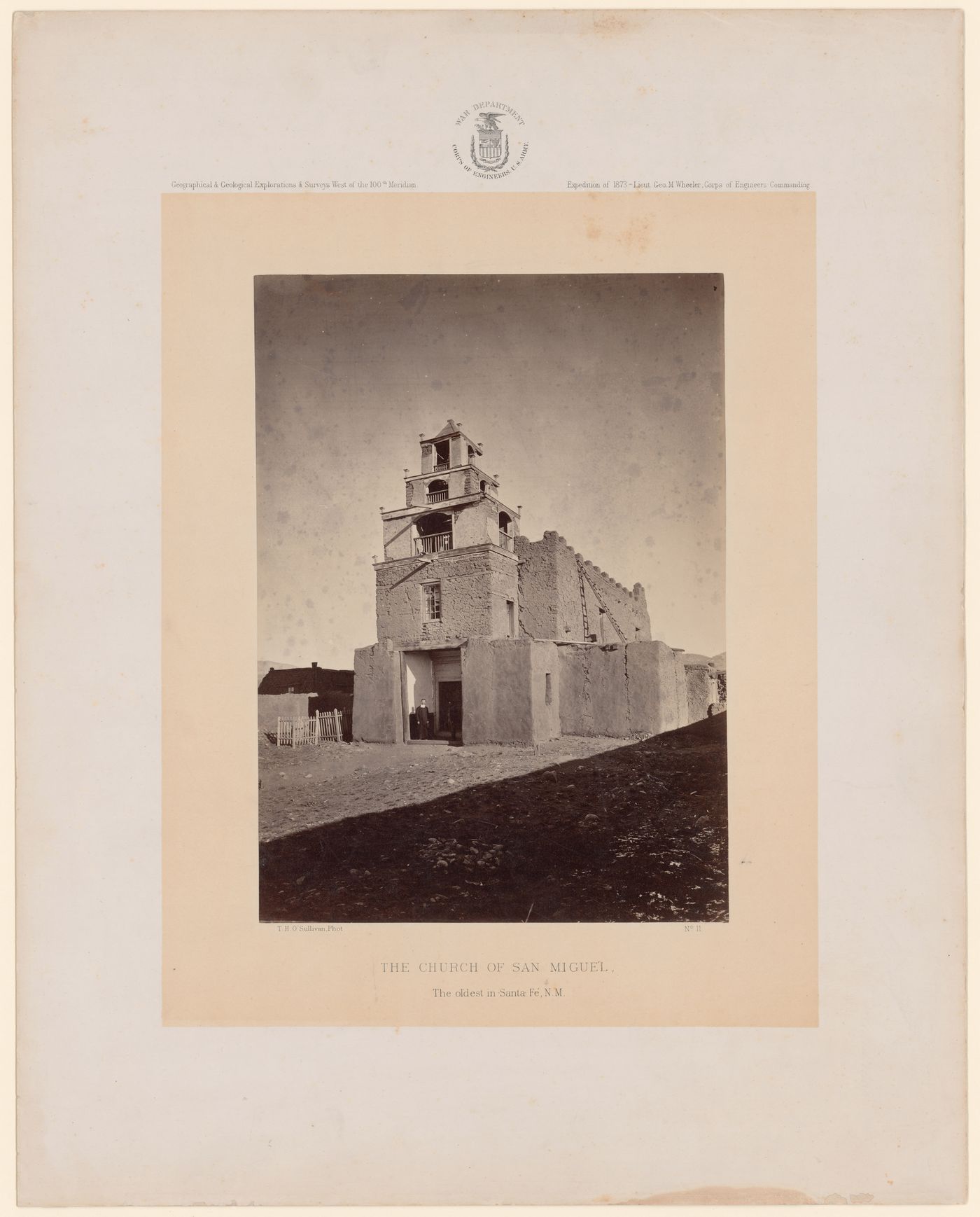View of the Church of San Miguel with a priest in the doorway, Santa Fe, New Mexico, United States