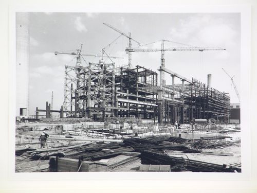 View of cranes and construction of steel structure for power station, from exterior, United Kingdom