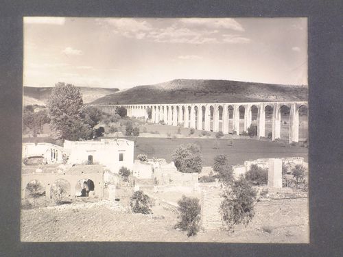 View of ruins and the aqueduct of Querétaro with hills in the background, Querétaro, Mexico