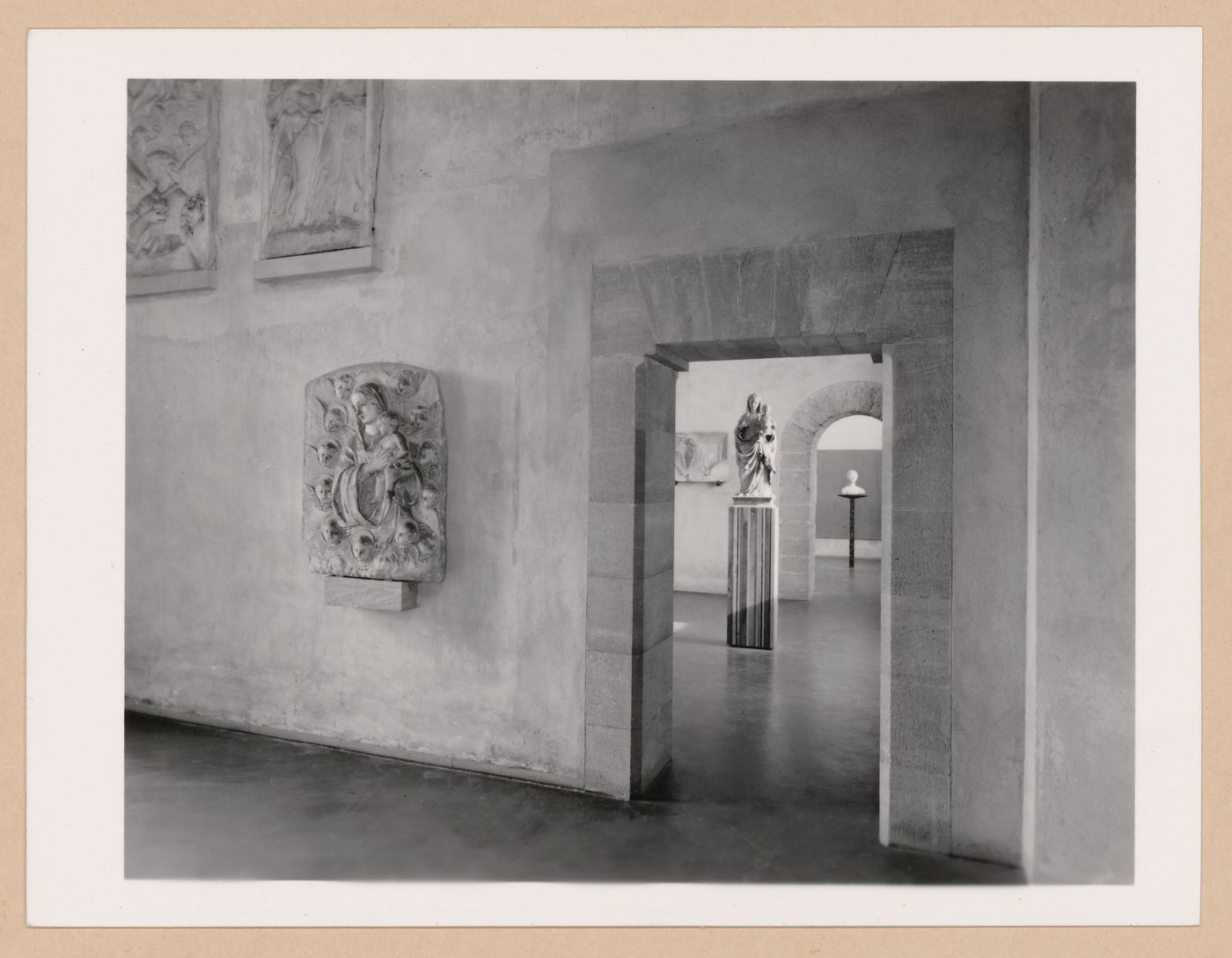 Interior view of the Sala della scultura showing reliefs and a doorway and the Sala dei Gagini, Palazzo Abatellis, Galleria regionale della Sicilia, Palermo, Italy