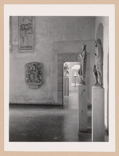 Interior view of the Sala della scultura, a doorway and the Sala dei Gagini showing statues, Palazzo Abatellis, Galleria regionale della Sicilia, Palermo, Italy