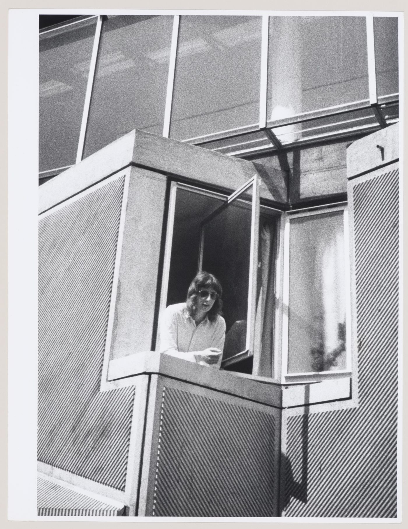 View of a man leaning out the window of Andrew Melville Hall, University of St. Andrews, St. Andrews, Scotland