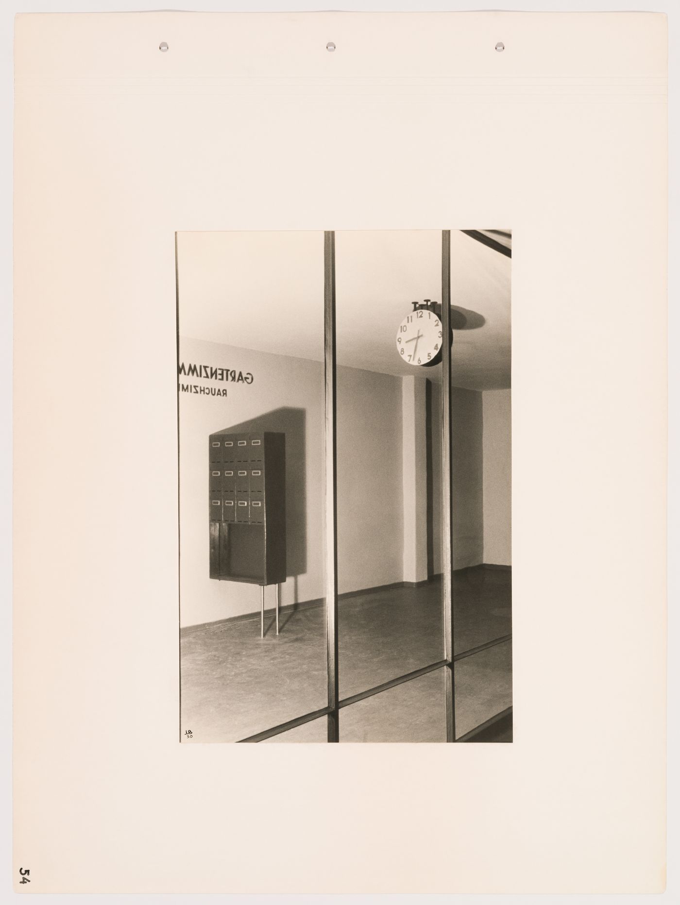 Interior view of a corridor with mailboxes and a clock through a glass partition wall, Budge Foundation Old People's Home, Frankfurt am Main, Germany