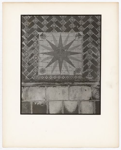 Close-up view of painted tiles, some of which form a sun design, Mexico