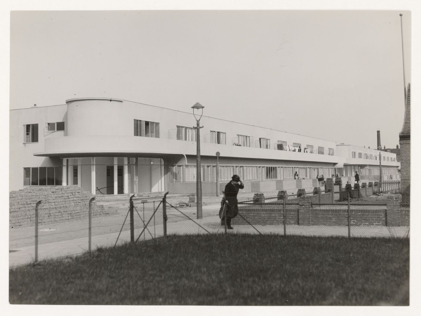 Exterior view of industrial row houses from across the street, Hoek van Holland, Netherlands