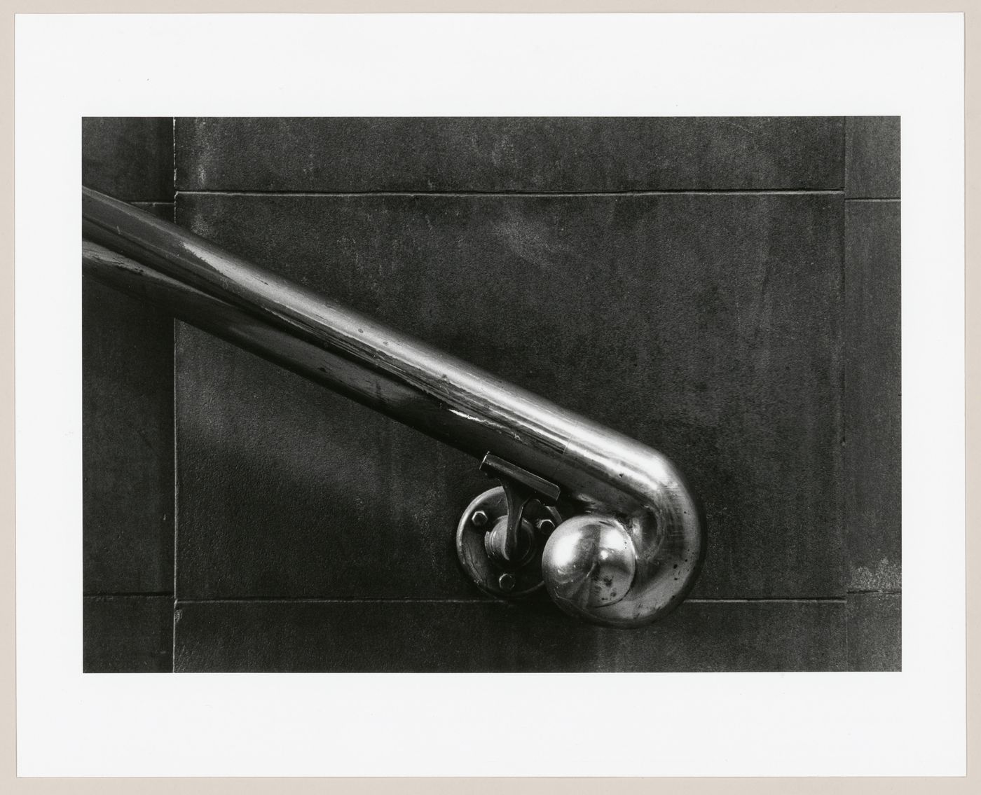 Close-up view of a handrail at the rue Saint-Antoine entrance of Windsor Station, Montréal, Québec